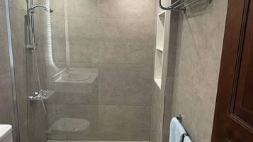 Shower, bidet, towels, soap