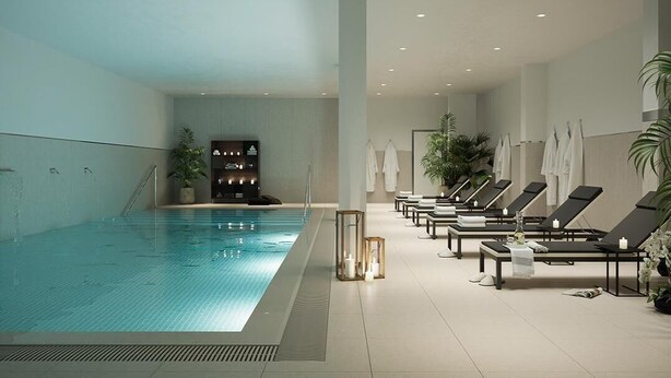 A swimming pool with lounge chairs and a reception area. - Célere Vitta Nature - Mijas costa, Andalucía (Mijas costa)