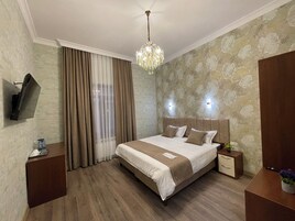 In-room safe, laptop workspace, blackout curtains, soundproofing