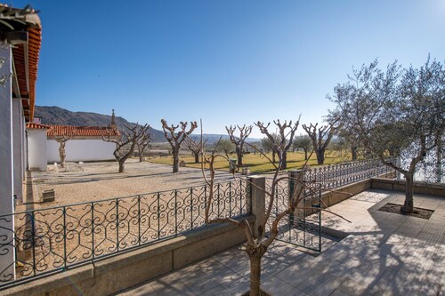 Semi-detached holiday home on an estate with a swimming pool