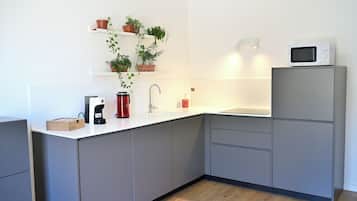 Condo | Área de estar | Smart TV 40 polegadas com canais digitais