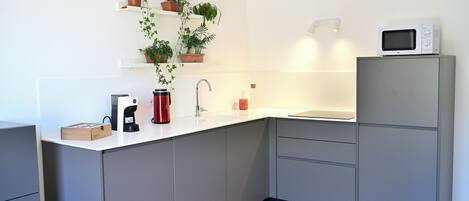 Condo | Living area | 40-inch Smart TV with digital channels