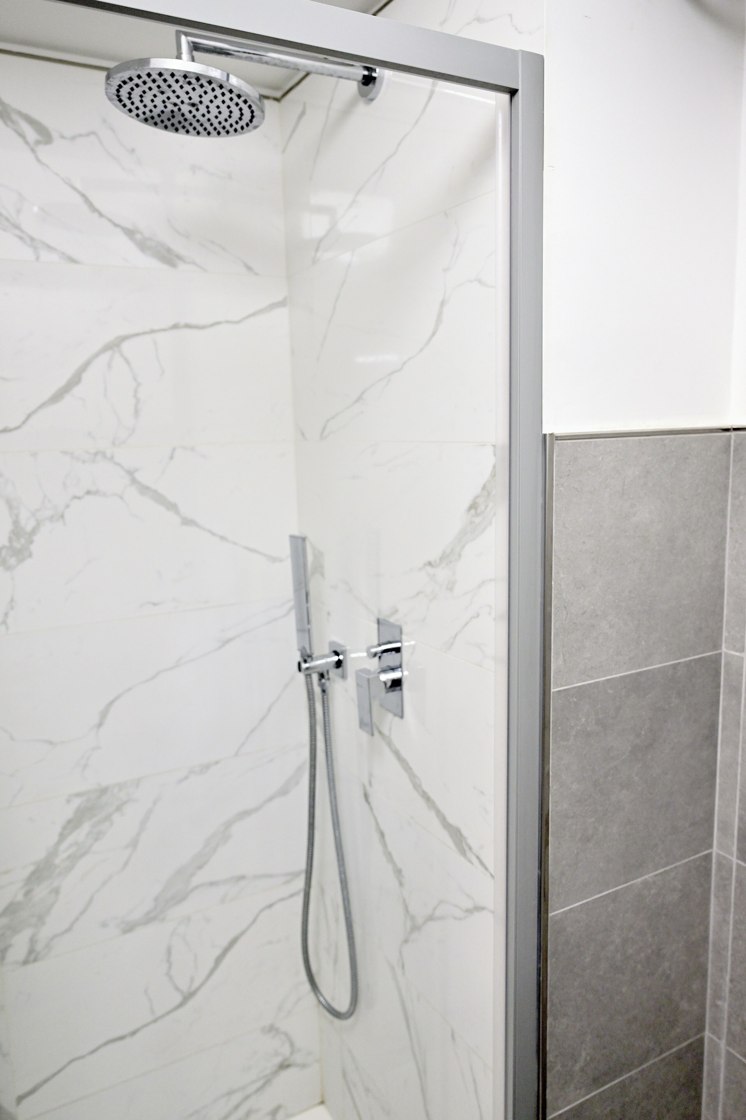 Condo | Bathroom | Shower, towels, soap, shampoo