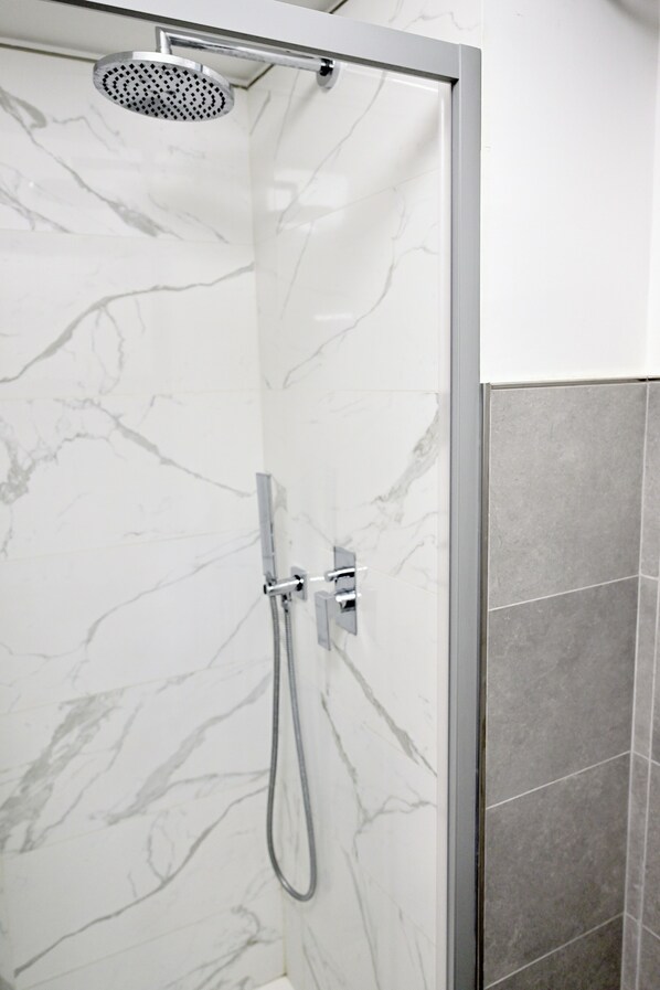 Condo | Bathroom | Shower, towels, soap, shampoo