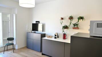 Condo | Área de estar | Smart TV 40 polegadas com canais digitais