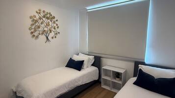 2 dormitoris, planxa i posts de planxar, wifi gratuïta i roba de llit