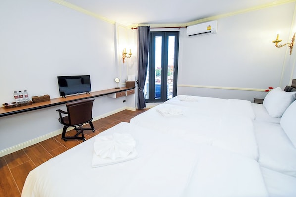 Blackout curtains, soundproofing, free WiFi, bed sheets