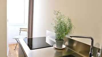 Apartment | Private kitchen | Fridge, microwave, stovetop, dishwasher