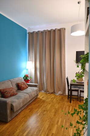 Apartment | Living area | Flat-screen TV - At Home Montebello (Rome)