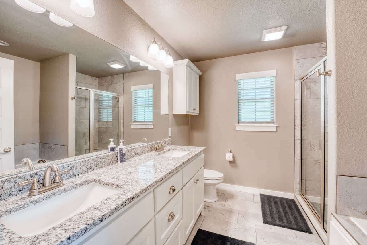 Shower, hair dryer, towels, shampoo