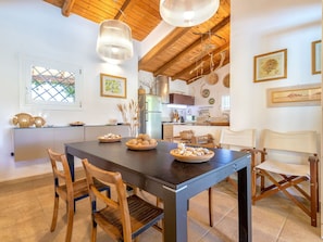 Dining - Wonderful private villa for 4 people with A/C, WIFI, private pool, TV and patio (Loiri Porto San Paolo)