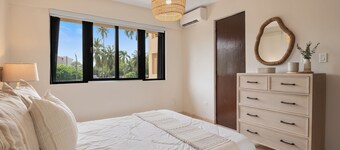 Tropical escape | Beachfront 2-bedroom condo | perfect for families and couples