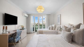 1 habitación, tabla de planchar con plancha y cuna de viaje