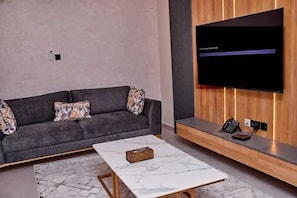 Family Apartment, Balcony, City View | Living area