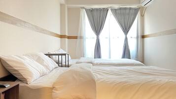 Desk, laptop workspace, free WiFi, bed sheets