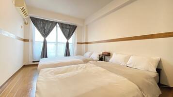 城市公寓, 4 间卧室, 城市景观 | 办公桌、笔记本电脑工作区、免费 WiFi、床单