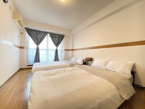 Apartemen Kota, 4 kamar tidur, pemandangan kota | Meja kerja, ruang kerja ramah laptop, Wi-Fi gratis, dan seprai linen