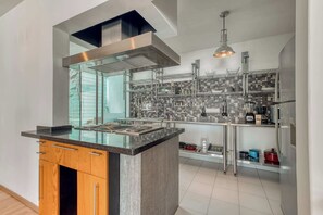 Fridge, microwave, stovetop, coffee/tea maker