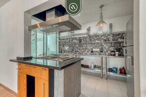 Fridge, microwave, stovetop, coffee/tea maker
