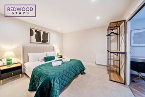 1 bedroom, desk, iron/ironing board, travel cot