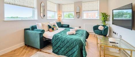 1 bedroom, desk, iron/ironing board, travel cot