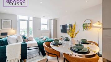 1 bedroom, desk, iron/ironing board, travel crib