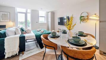 1 bedroom, desk, iron/ironing board, travel crib