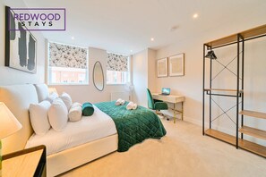 1 bedroom, desk, iron/ironing board, travel cot