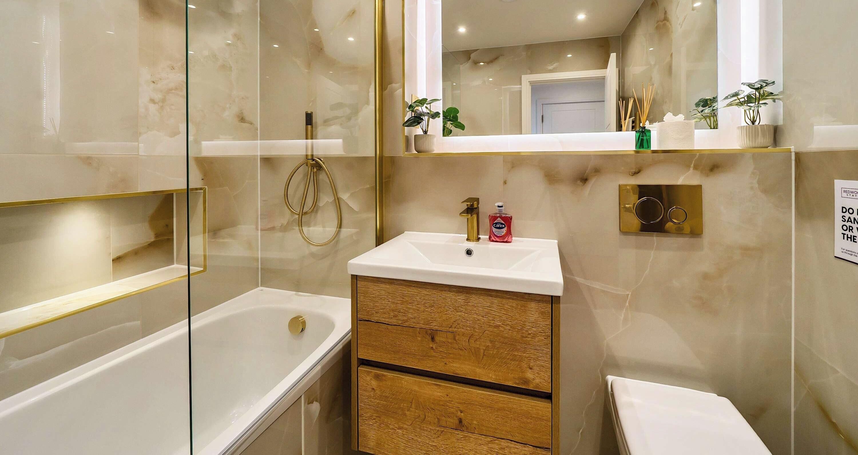 Shower, hair dryer, towels, shampoo