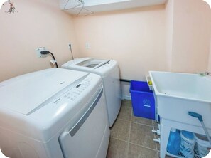 Bidet, towels, soap, toilet paper