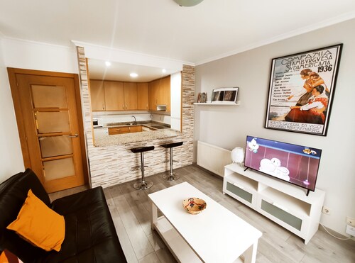 Apartment with garage next to the train and bus station.