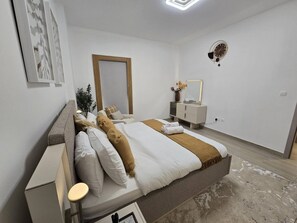 2 chambres, fer et planche à repasser, accès au Wi-Fi (inclus)