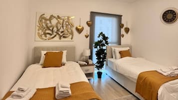 2 chambres, fer et planche Ă repasser, Wi-Fi gratuit, draps fournis