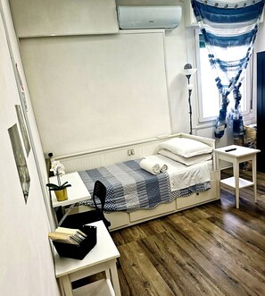 Enkeltværelse - 1 enkeltseng - aircondition | Mørklægningsgardiner, gratis Wi-Fi, sengetøj