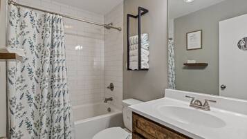 Hair dryer, towels, soap, toilet paper