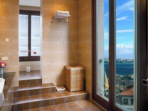 Superior Condo, Partial Sea View | Bathroom | Hair dryer, bathrobes, slippers, towels