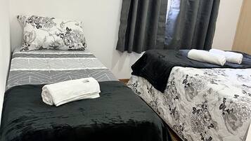 2 bedrooms, iron/ironing board, WiFi, bed sheets