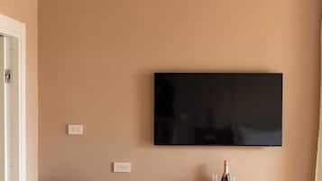 Luxury Double Room, Balcony, City View | In-room safe, desk, laptop workspace, iron/ironing board