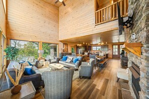 TV, fireplace, video games - Swim in the Clouds | Luxe 6BR Cabin w/ Views & Pool (Pigeon Forge)