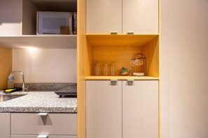 Fridge, microwave, coffee/tea maker, toaster