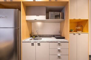 Fridge, microwave, coffee/tea maker, toaster