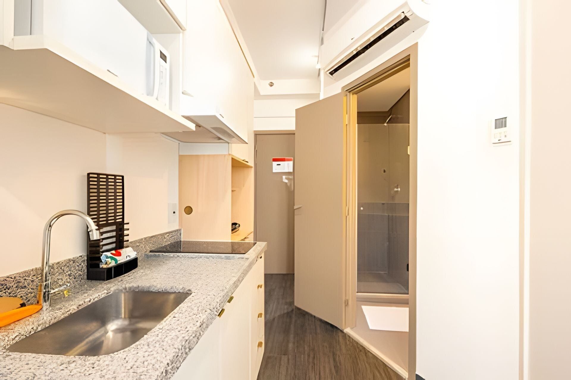 Fridge, microwave, coffee/tea maker, cookware/dishes/utensils