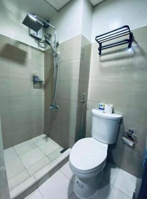 Hair dryer, towels, soap, toilet paper