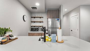 Fridge, microwave, dishwasher, coffee/tea maker