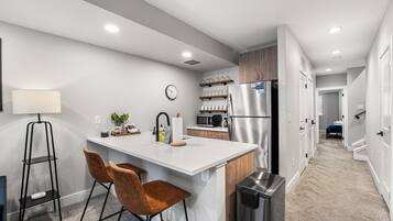 Fridge, microwave, dishwasher, coffee/tea maker