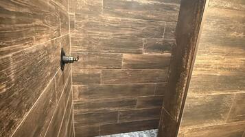 Shower, towels, soap, toilet paper