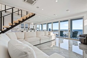 House, Multiple Beds, Patio, Ocean View (Crescent’s Pearl) | Living area | 55-inch flat-screen TV with digital channels, fireplace