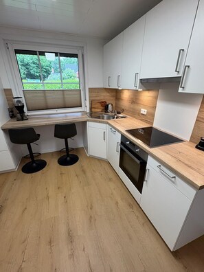 Mikrovågsugn, spishäll och diskmaskin