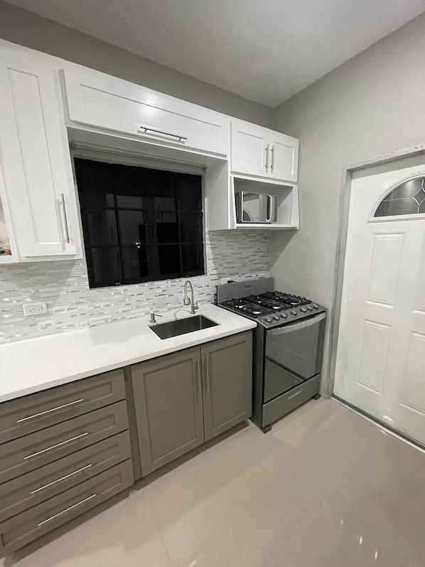 Fridge, microwave, oven, stovetop