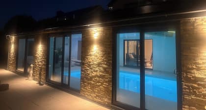 Stunning Beach House beautiful sea-view large indoor swimming pool and a hot tub